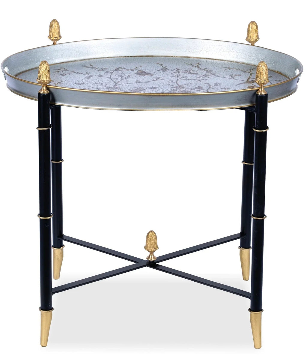 Table ronde en étain noir avec embouts dorés